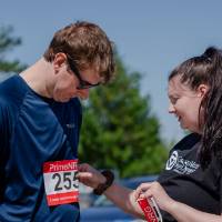 Participants fix their bibs before the race.